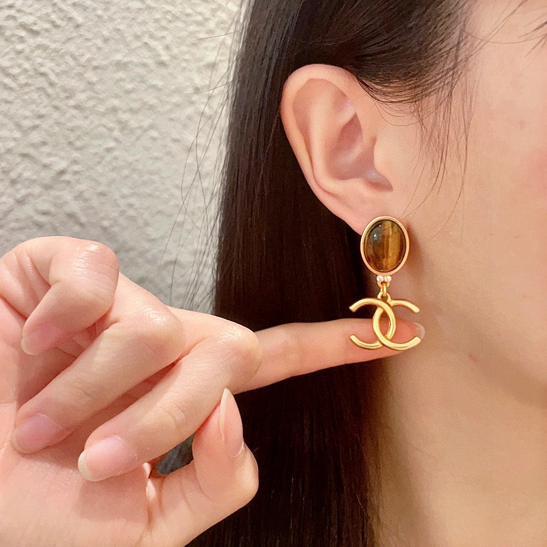 Chanel Interlocking C Earrings - album image 2