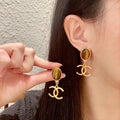 Chanel Interlocking C Earrings - album image 1