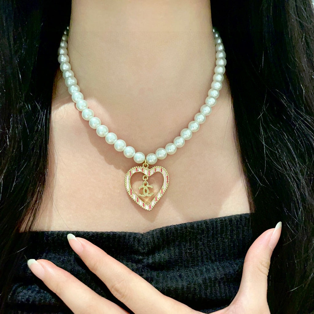 Chanel Interlocking C Pearl Heart Necklace - album image 2