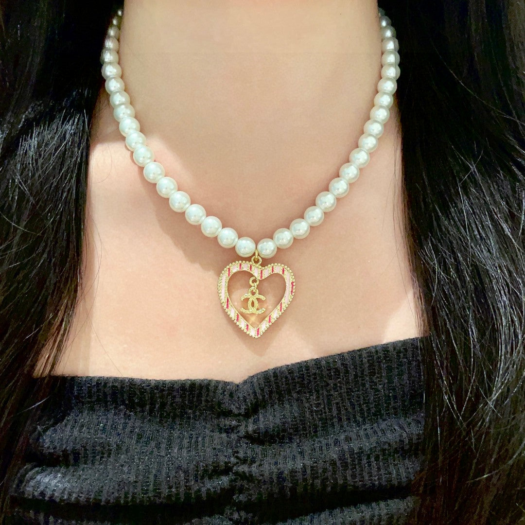 Chanel Interlocking C Pearl Heart Necklace - album image 3