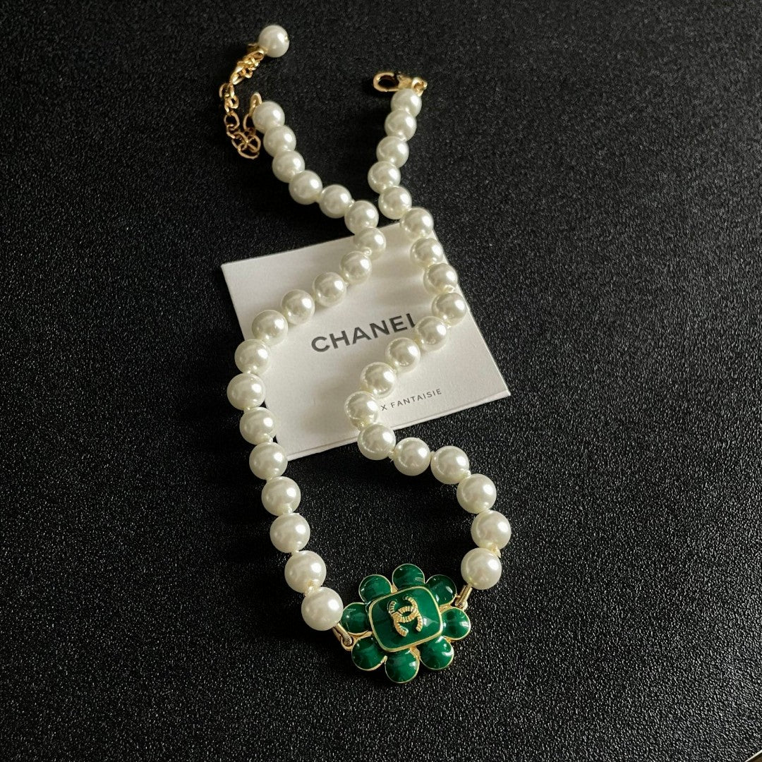 Chanel Interlocking C Pearl Necklace - album image 9