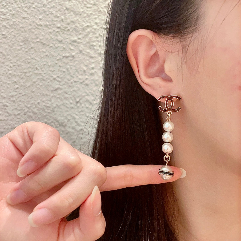 Chanel Interlocking C Pearl Earrings - album image 2