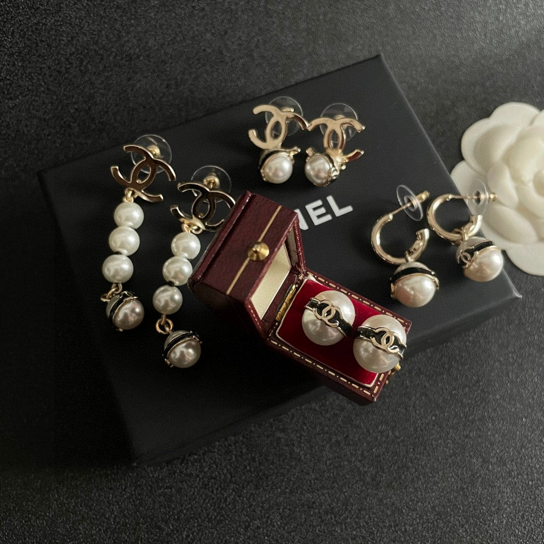 Chanel Interlocking C Pearl Earrings - album image 10
