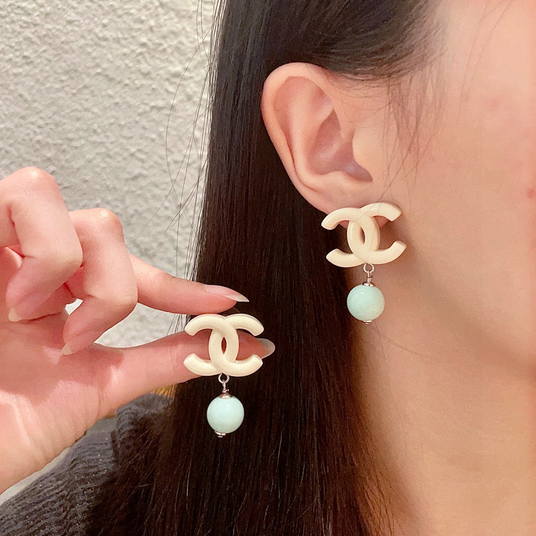Chanel Interlocking C Pearl Earrings - album image 1
