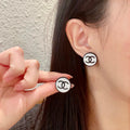 Chanel Interlocking C Stud Earrings - album image 1
