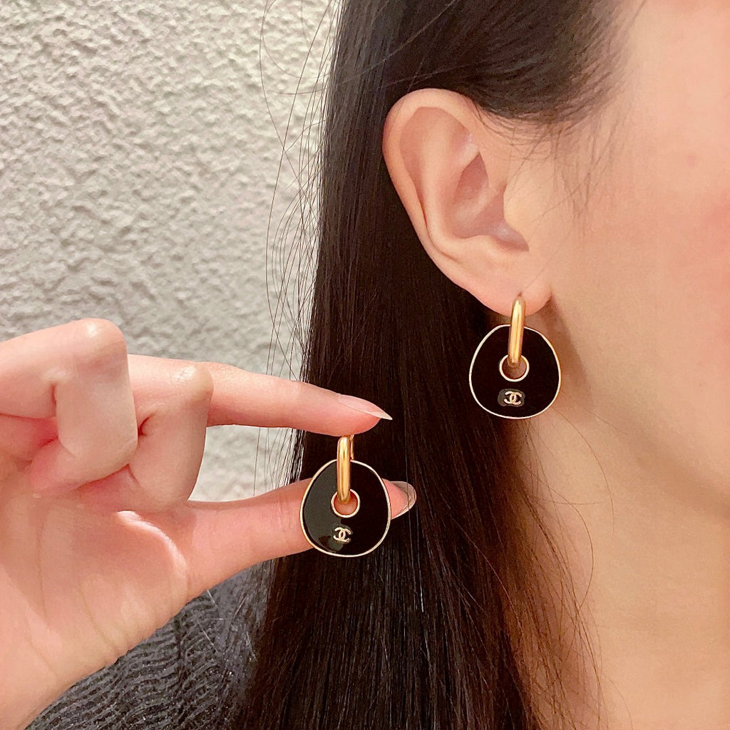 Chanel Interlocking C Earrings - album image 1