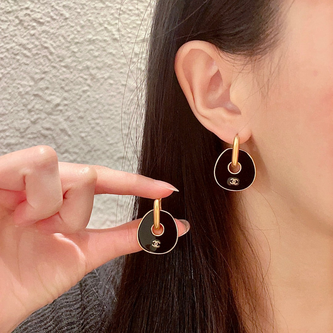 Chanel Interlocking C Earrings - album image 1