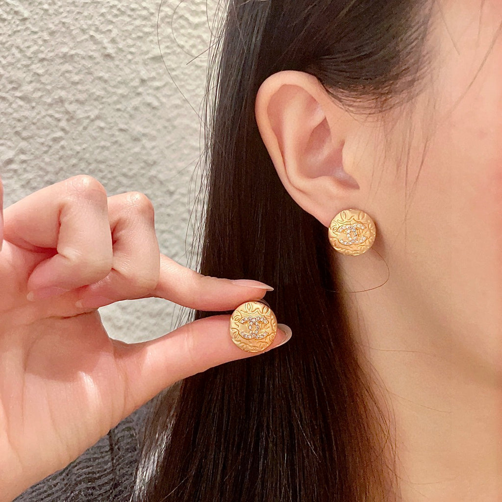 Chanel Interlocking C Stud Earrings - album image 1