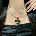 Chanel Interlocking C Heart Crystal Accent Necklace - album image 1