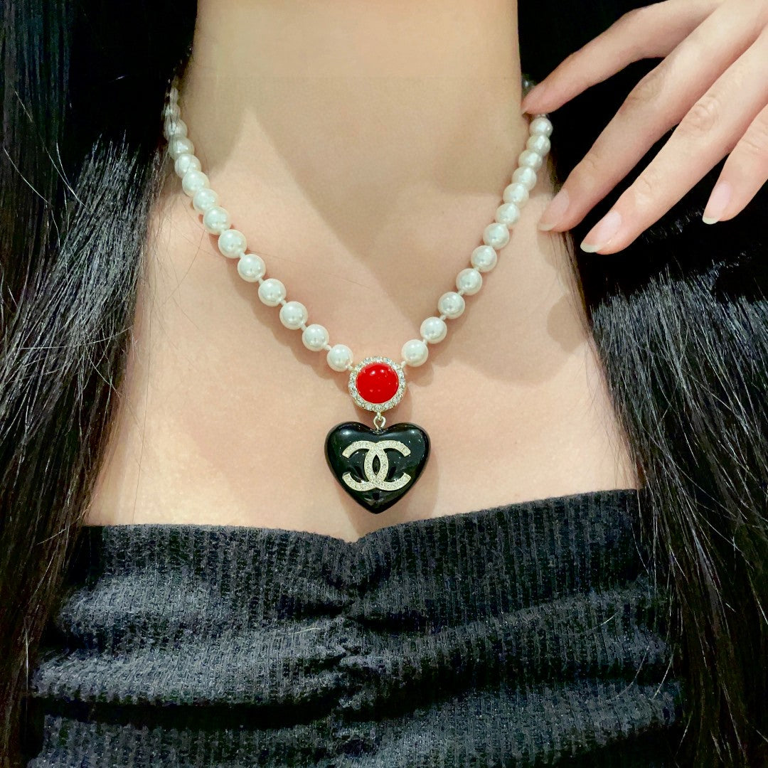 Chanel Interlocking C Heart Crystal Accent Necklace - album image 1