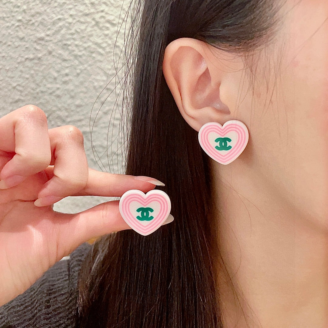Chanel Interlocking C Heart Stud Earrings - album image 1