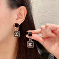 Chanel Interlocking C Chain Earrings - album image 1