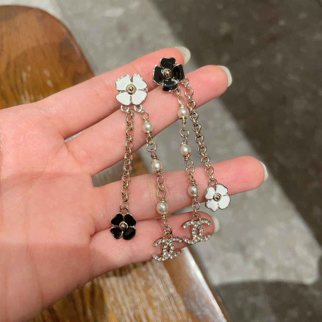 Chanel Interlocking C Camellia Earrings - album image 4