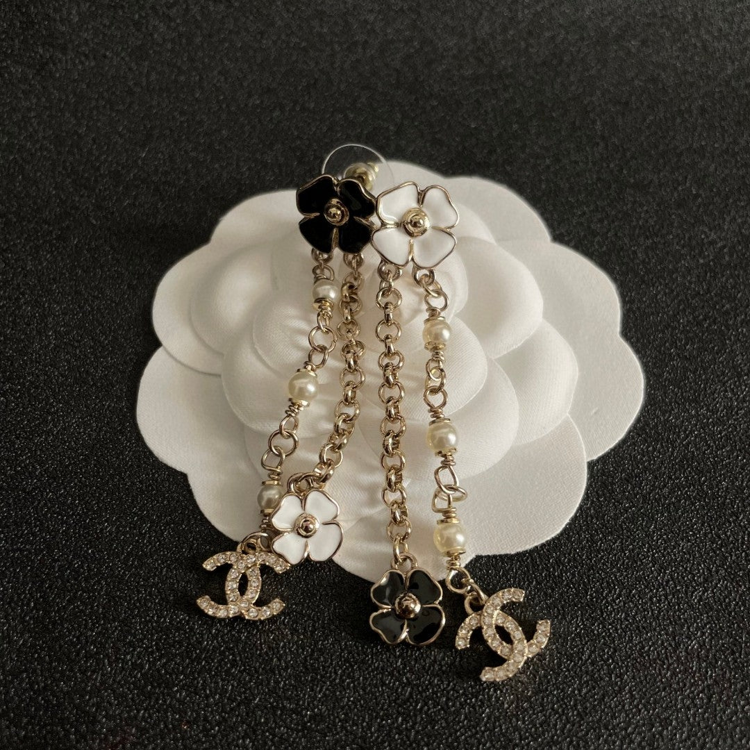 Chanel Interlocking C Camellia Earrings - album image 8