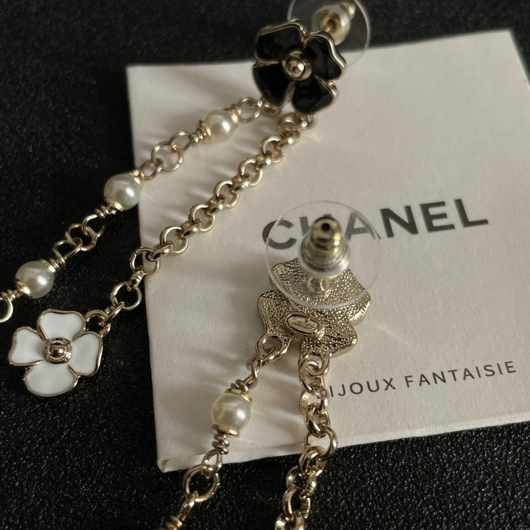 Chanel Interlocking C Camellia Earrings - album image 7
