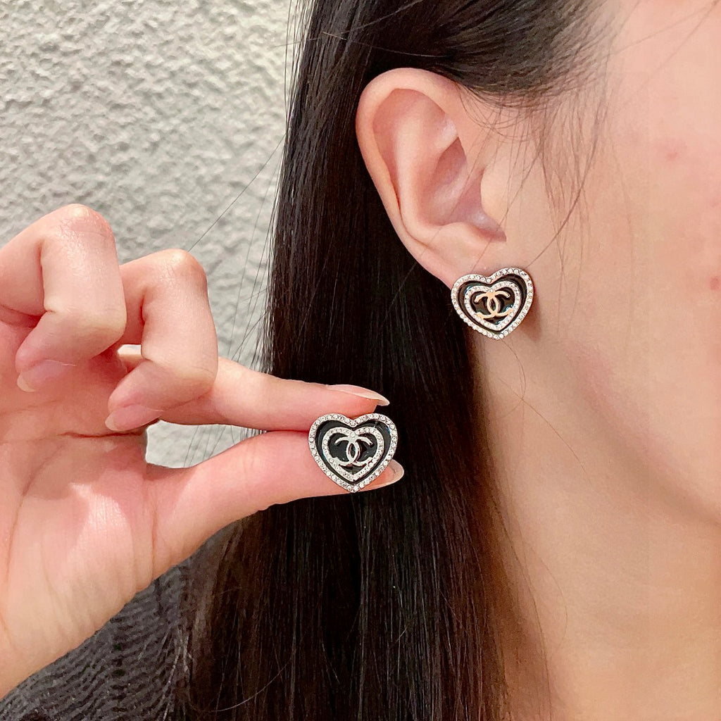 Chanel Interlocking C Heart Crystal Accent Stud Earrings - album image 1