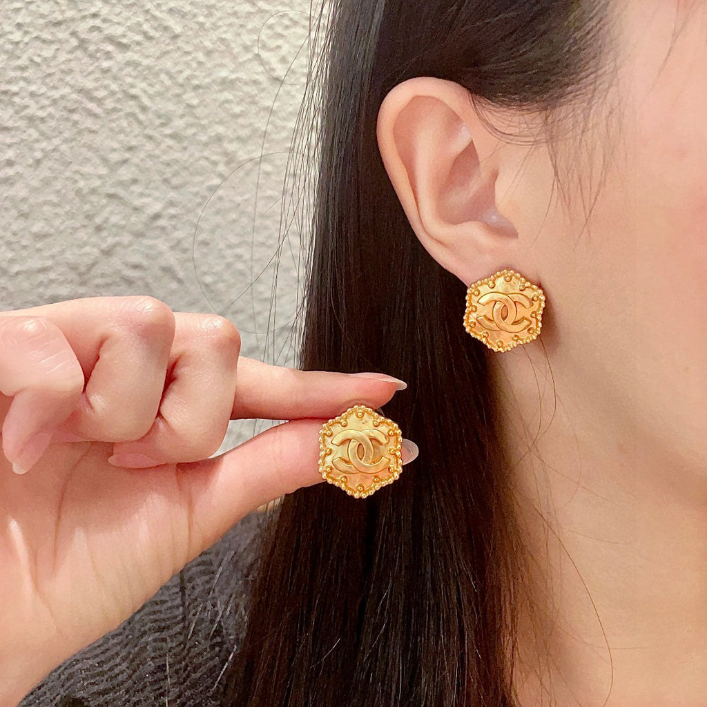 Chanel Interlocking C Stud Earrings - album image 1