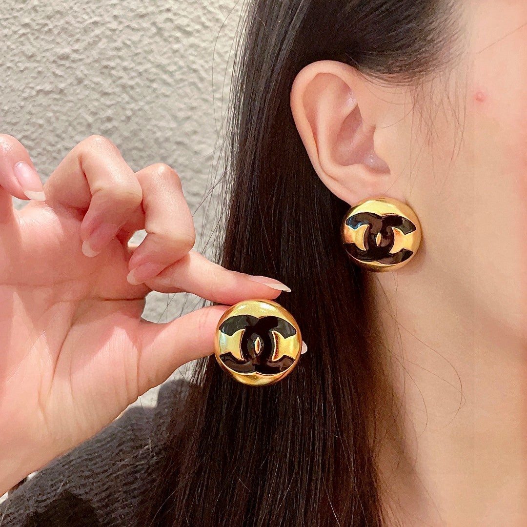 Chanel Interlocking C Circular Stud Earrings - album image 1
