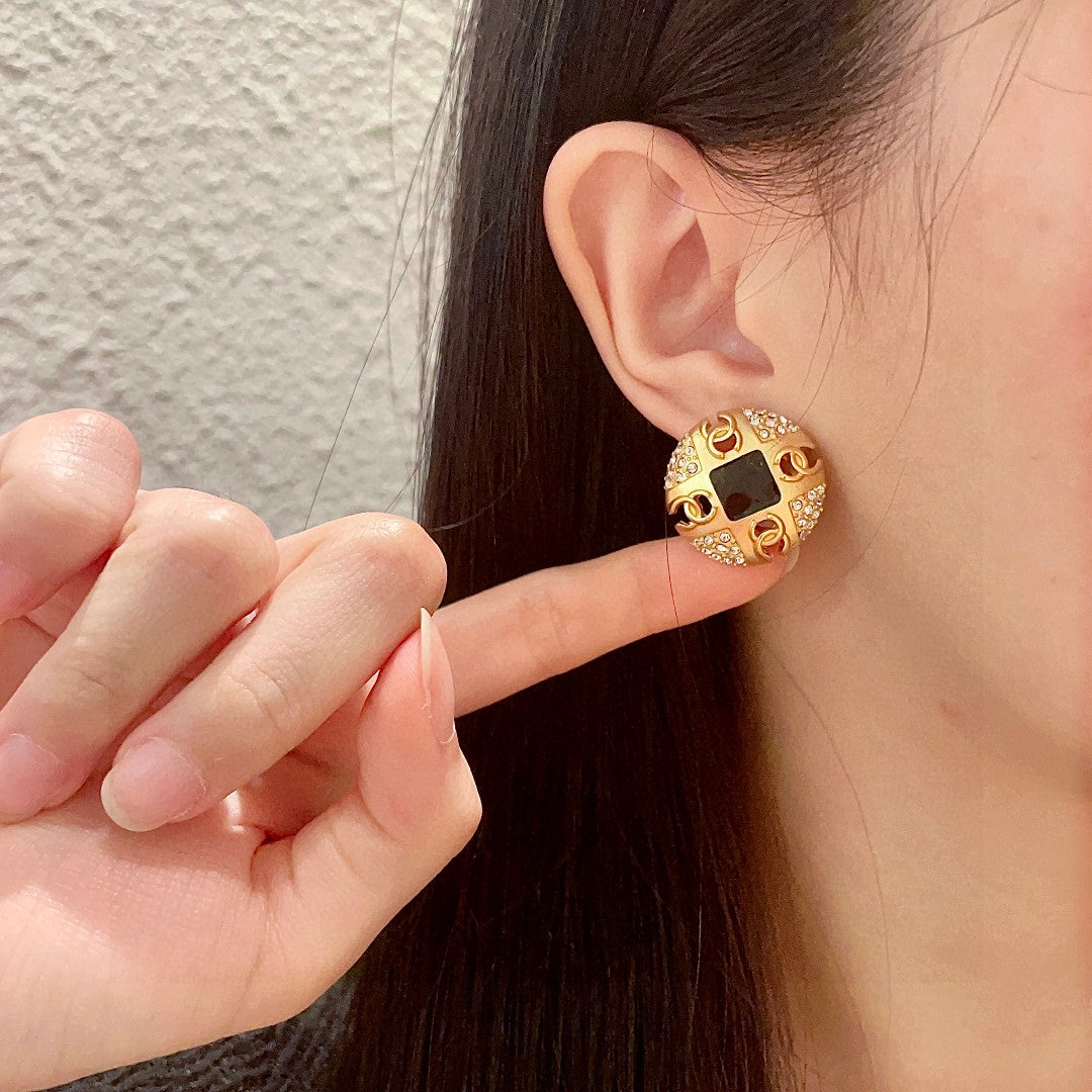Chanel Interlocking C Crystal Accent Stud Earrings - album image 2