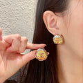 Chanel Interlocking C Stud Earrings - album image 1