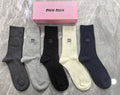 Miu Miu navy mix ribbed logo crew socks, image 1