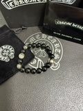 Chrome Hearts Black Bead Cross Spacer Bracelet - album image 1