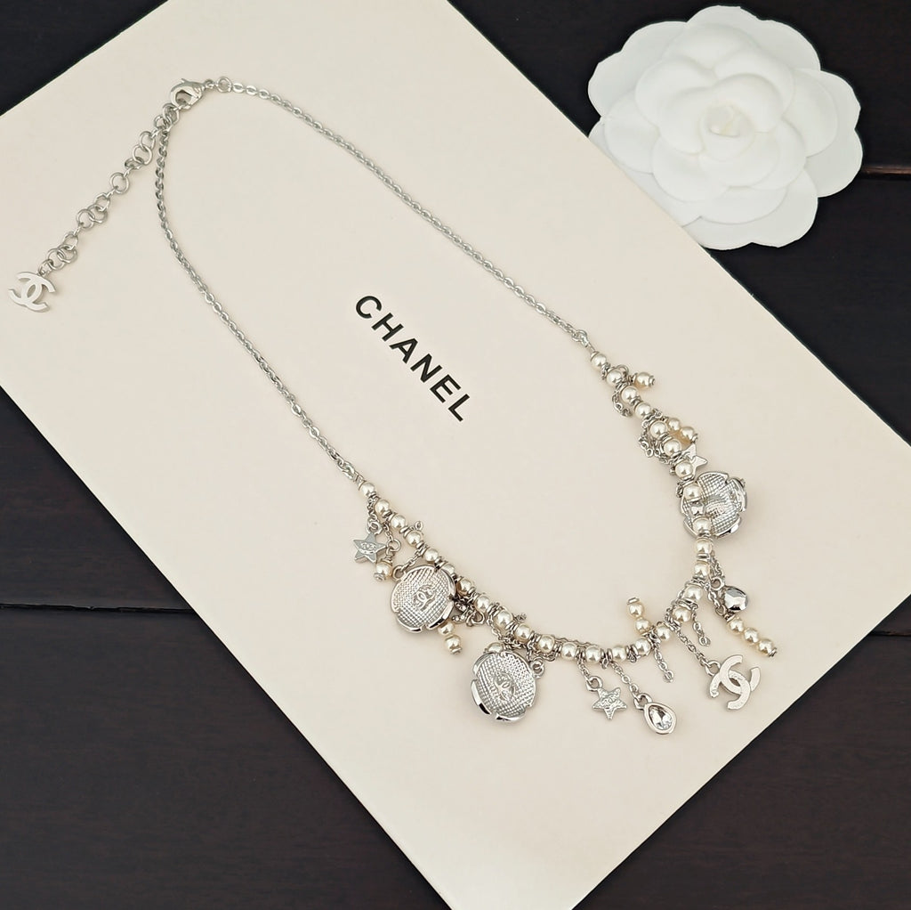 Chanel Silver-Tone Letter and Black Flower Necklace - album image 6
