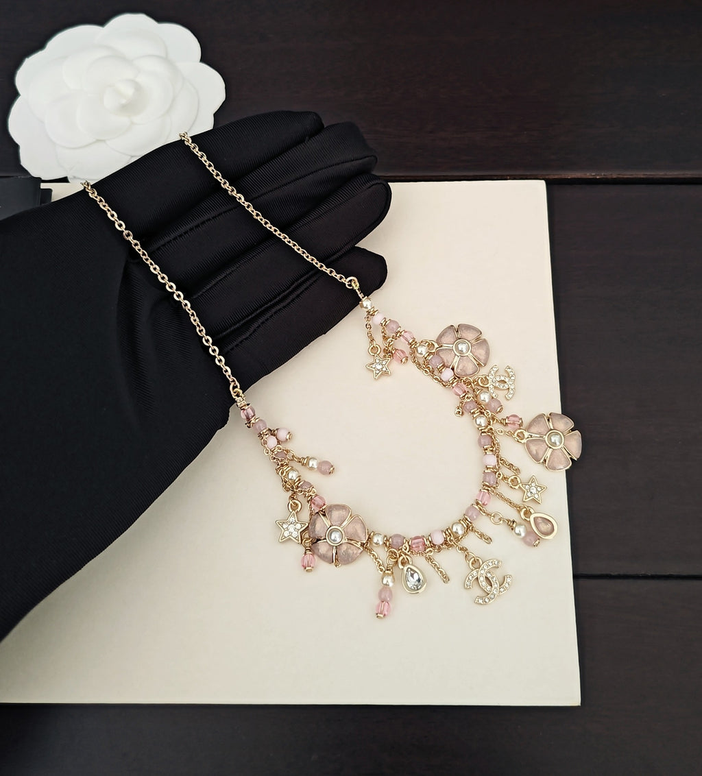 Chanel Gold-Tone Letter and Charm Necklace - album image 3