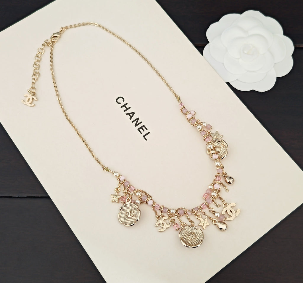 Chanel Gold-Tone Letter and Charm Necklace - album image 4