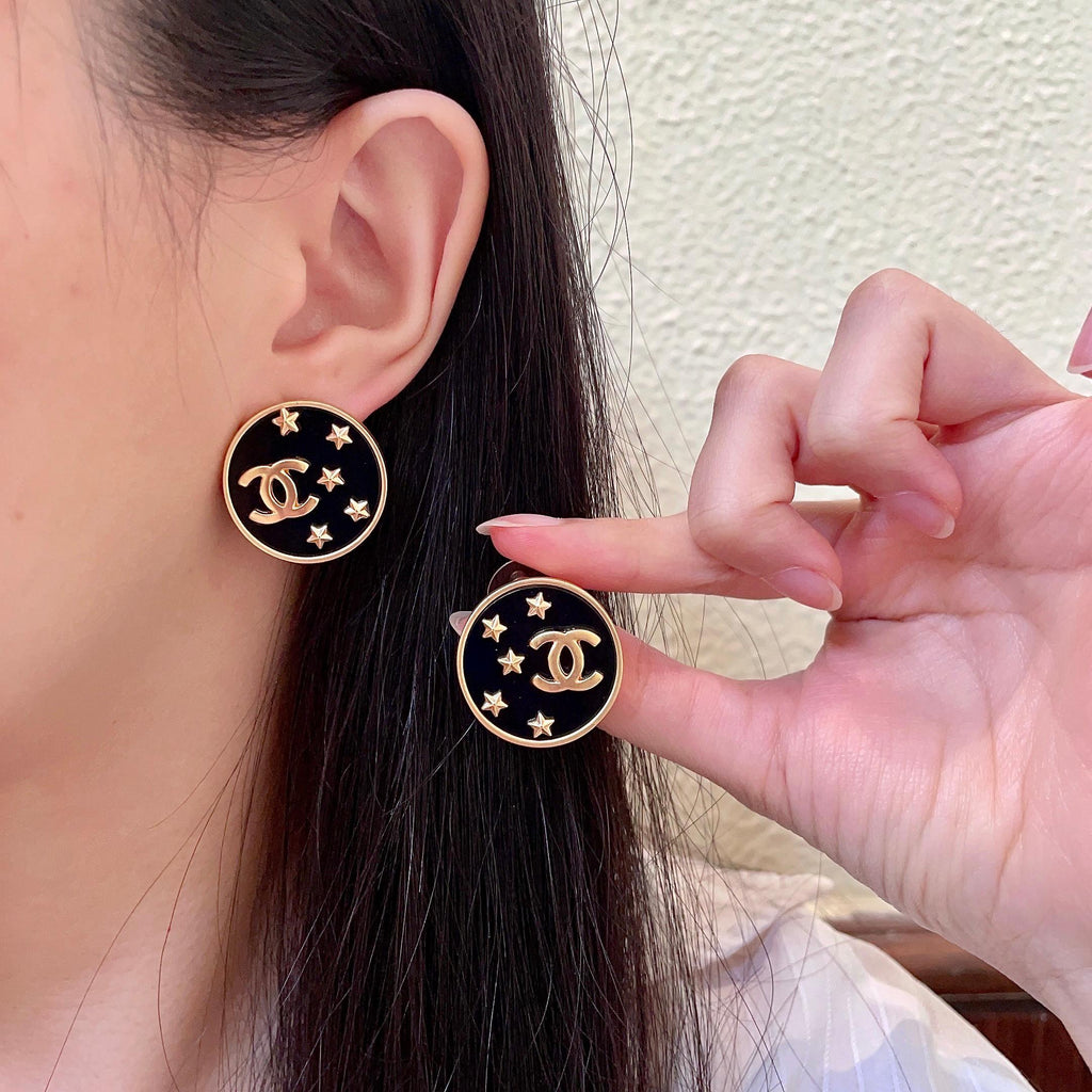 Chanel Interlocking C Star Stud Earrings - album image 1