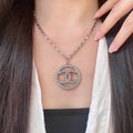 Chanel Interlocking C Crystal Accent Necklace - album image 1