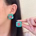 Chanel Interlocking C Stud Earrings - album image 1