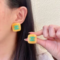 Chanel Interlocking C Stud Earrings - album image 1