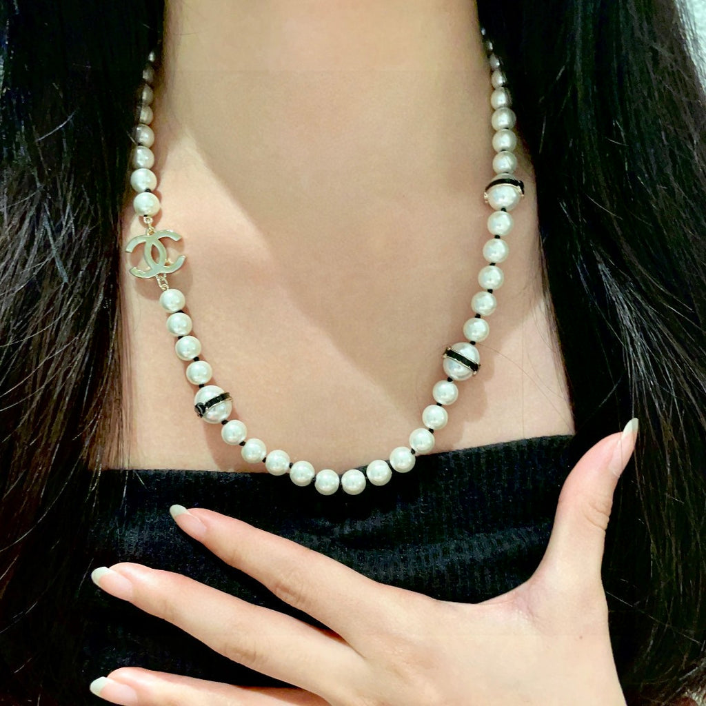 Chanel Interlocking C Pearl Necklace - album image 2
