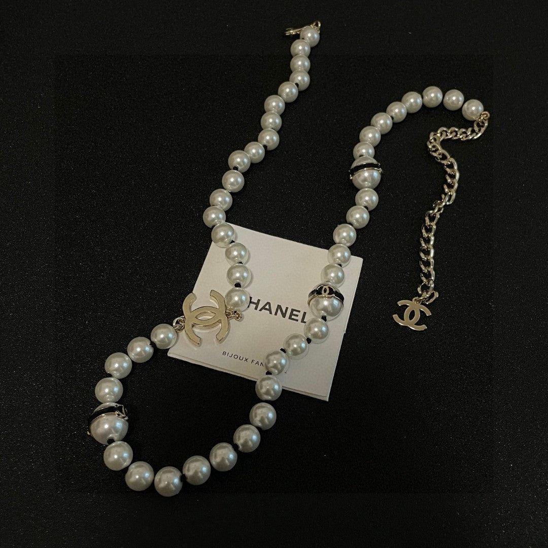 Chanel Interlocking C Pearl Necklace - album image 7
