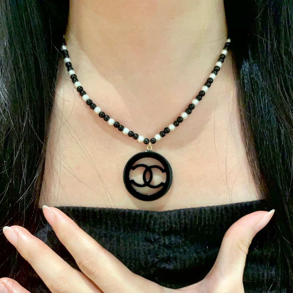 Chanel Interlocking C Pearl Necklace - album image 2