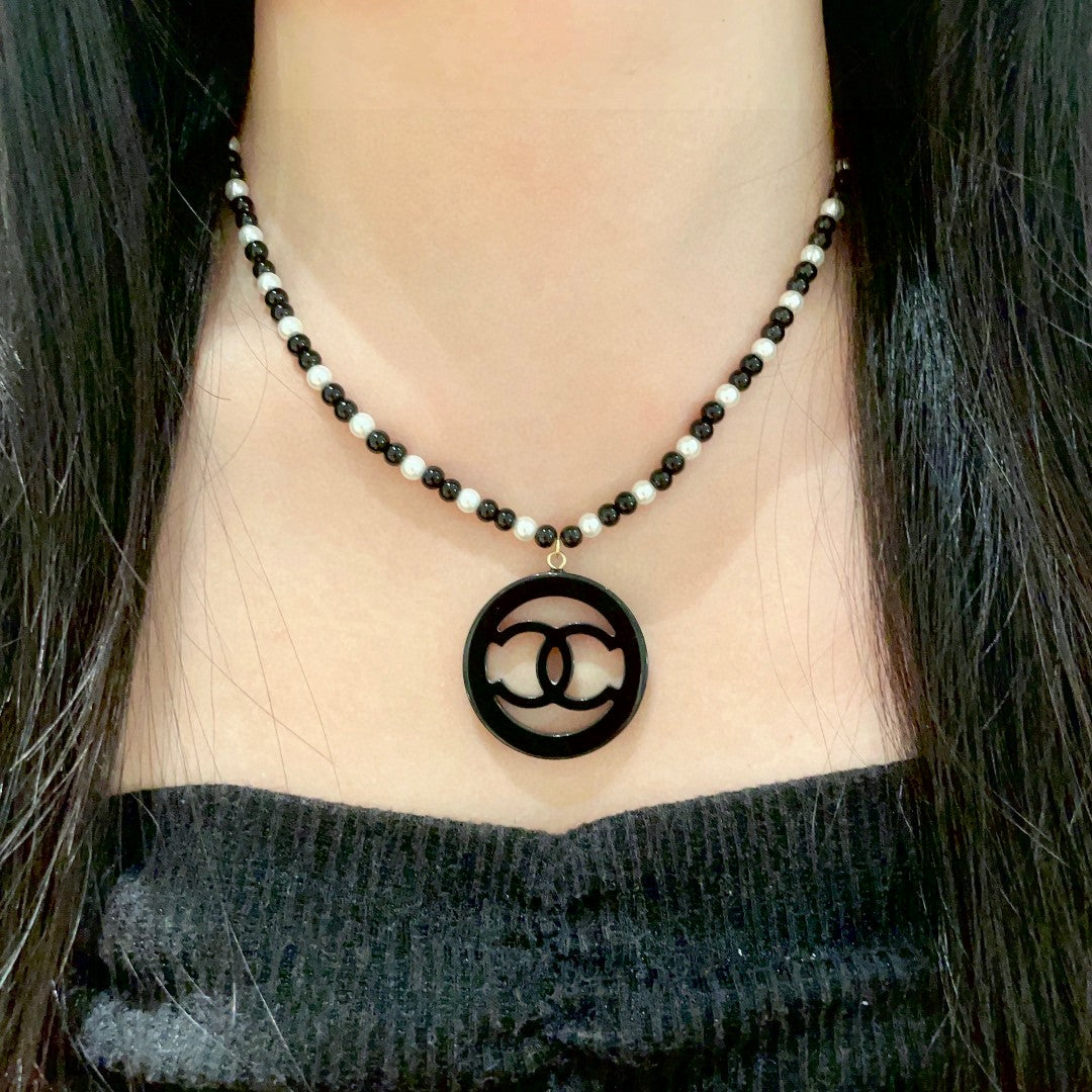 Chanel Interlocking C Pearl Necklace - album image 3