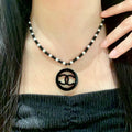Chanel Interlocking C Pearl Necklace - album image 1