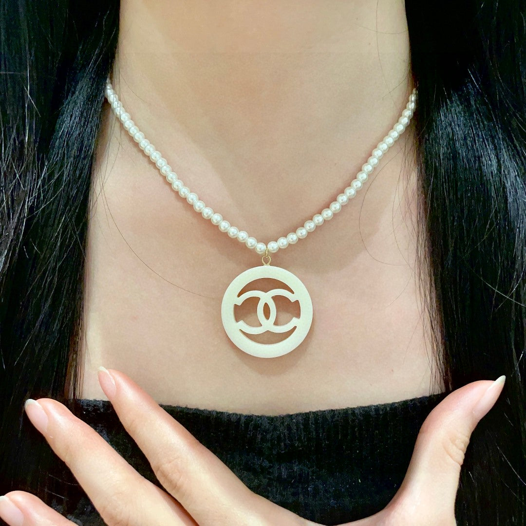 Chanel Interlocking C Pearl Circular Necklace - album image 2