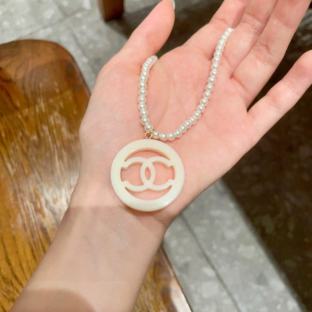 Chanel Interlocking C Pearl Circular Necklace - album image 4