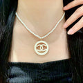 Chanel Interlocking C Pearl Circular Necklace - album image 1
