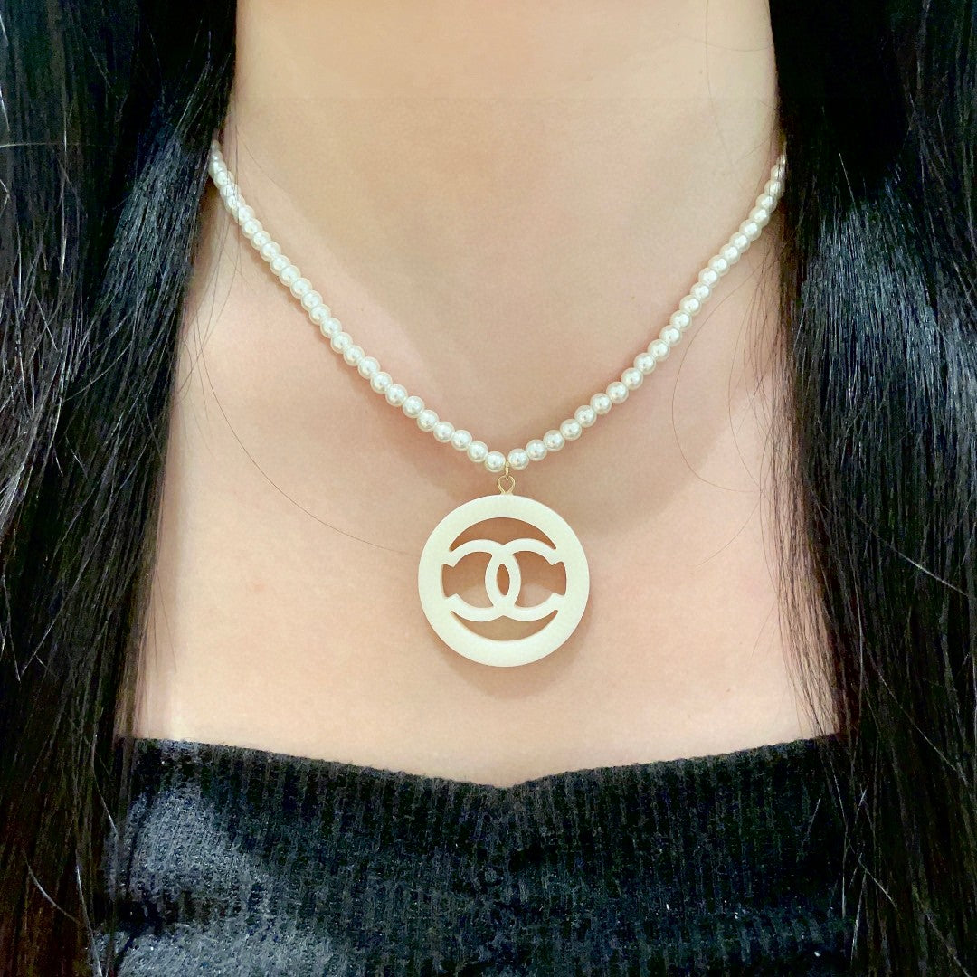 Chanel Interlocking C Pearl Circular Necklace - album image 3