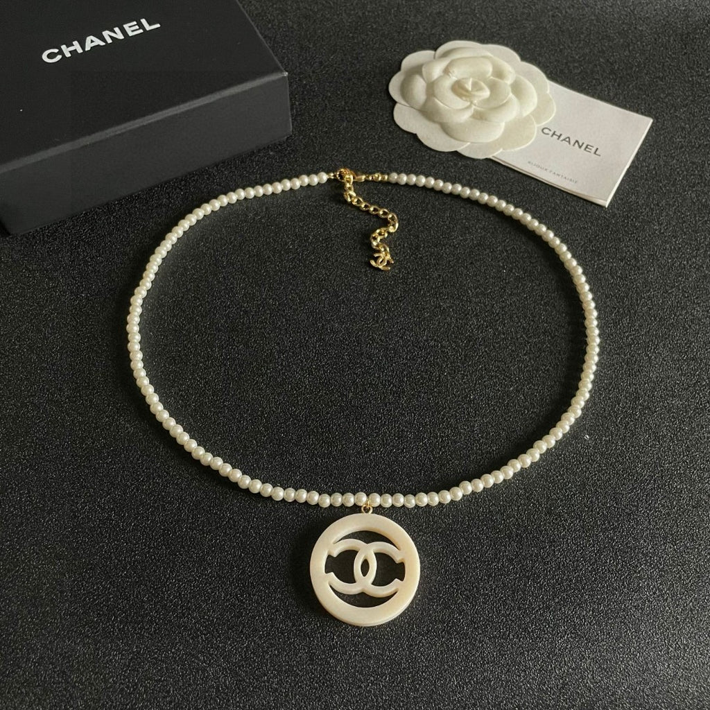 Chanel Interlocking C Pearl Circular Necklace - album image 9
