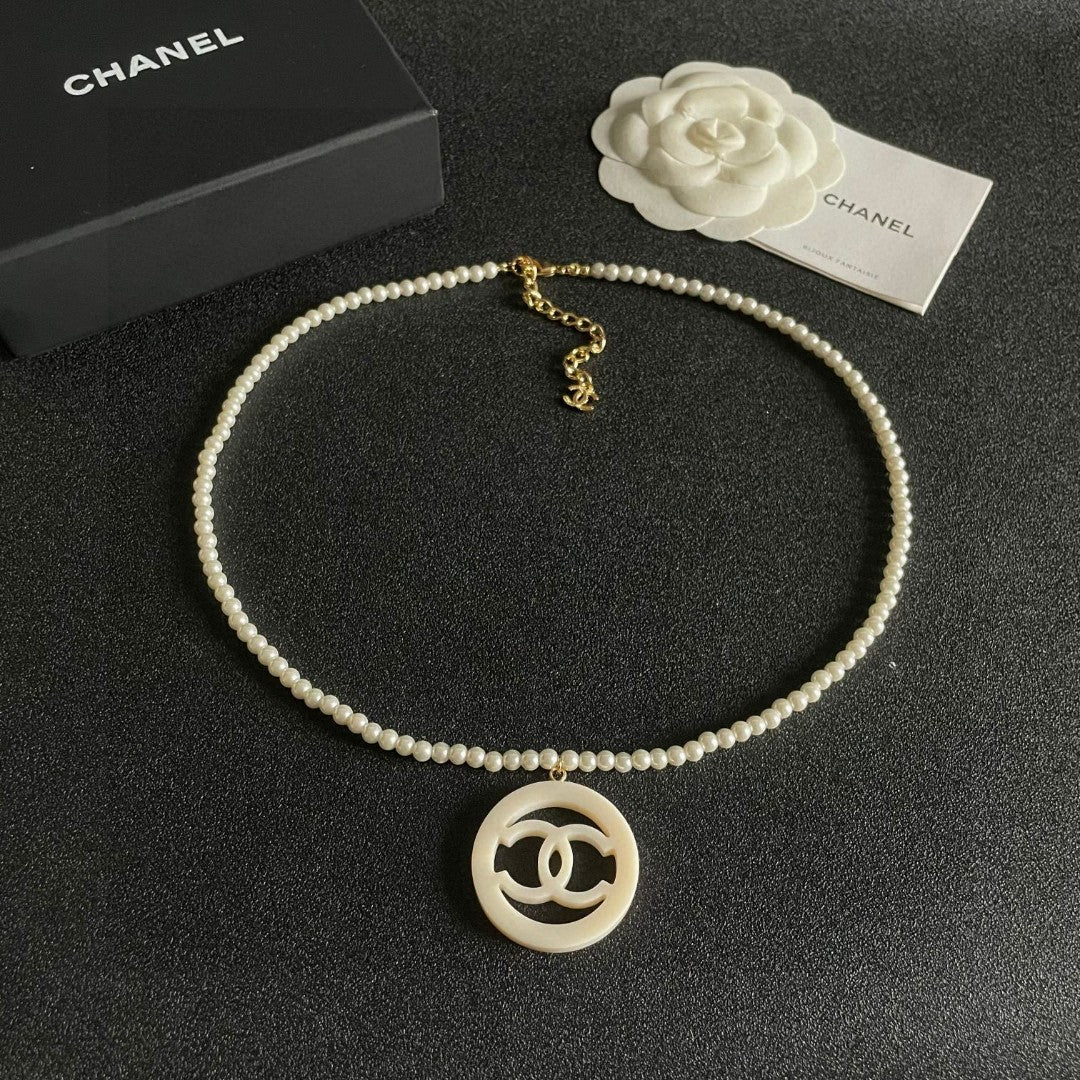 Chanel Interlocking C Pearl Circular Necklace - album image 9