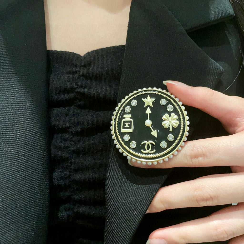 Chanel Interlocking C Perfume Bottle Brooch - album image 1
