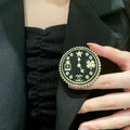 Chanel Interlocking C Perfume Bottle Brooch - album image 1