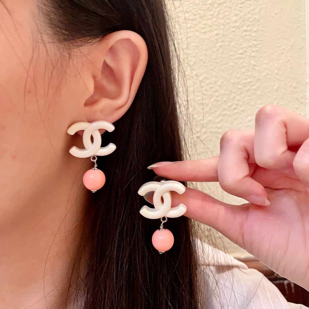 Chanel Interlocking C Pearl Earrings - album image 1