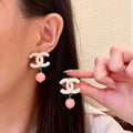 Chanel Interlocking C Pearl Earrings - album image 1