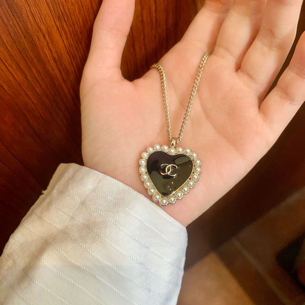 Chanel Interlocking C Pearl Heart Necklace - album image 4