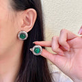 Chanel Interlocking C Stud Earrings - album image 1